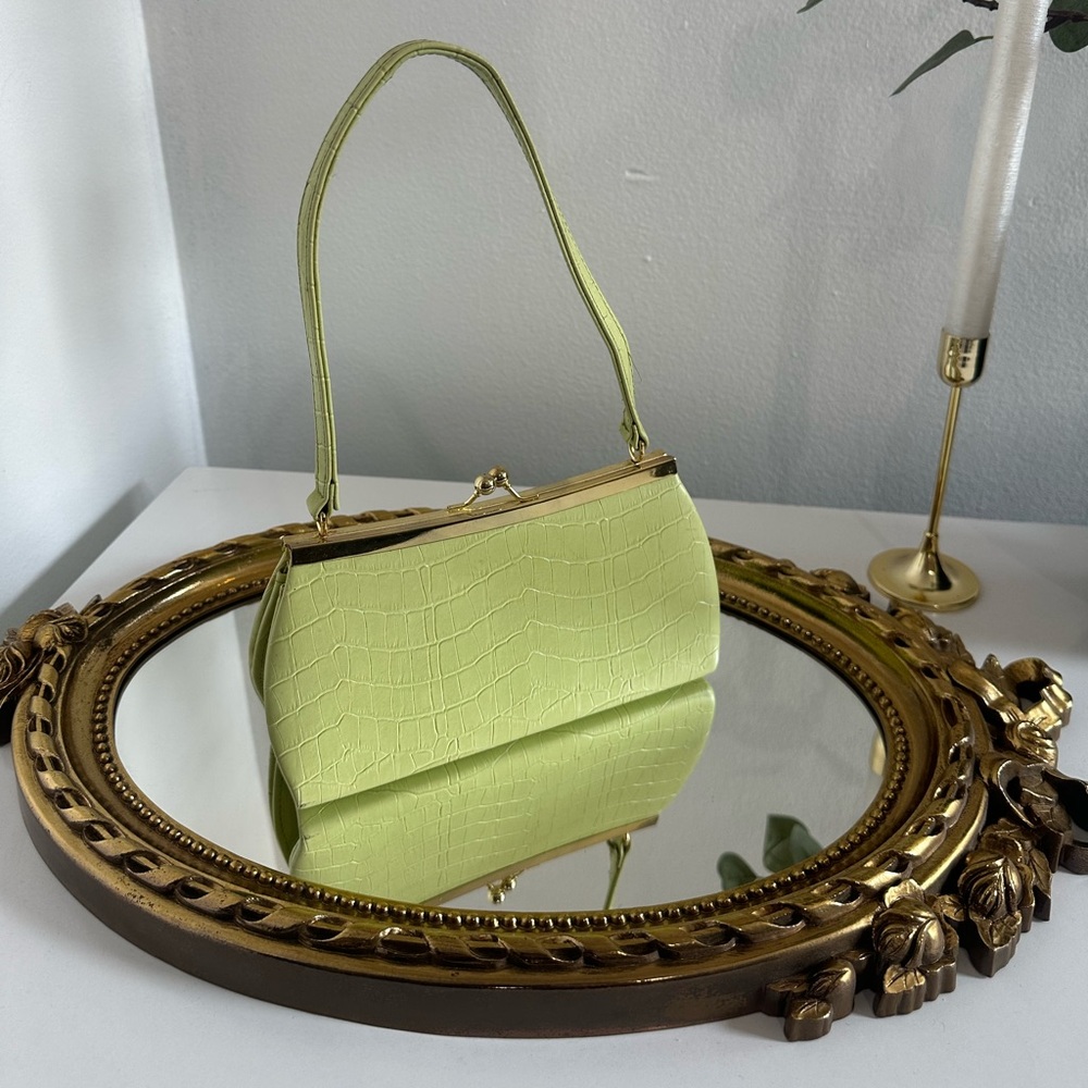 Elegant Clutch/Bag With Gold Hardware.